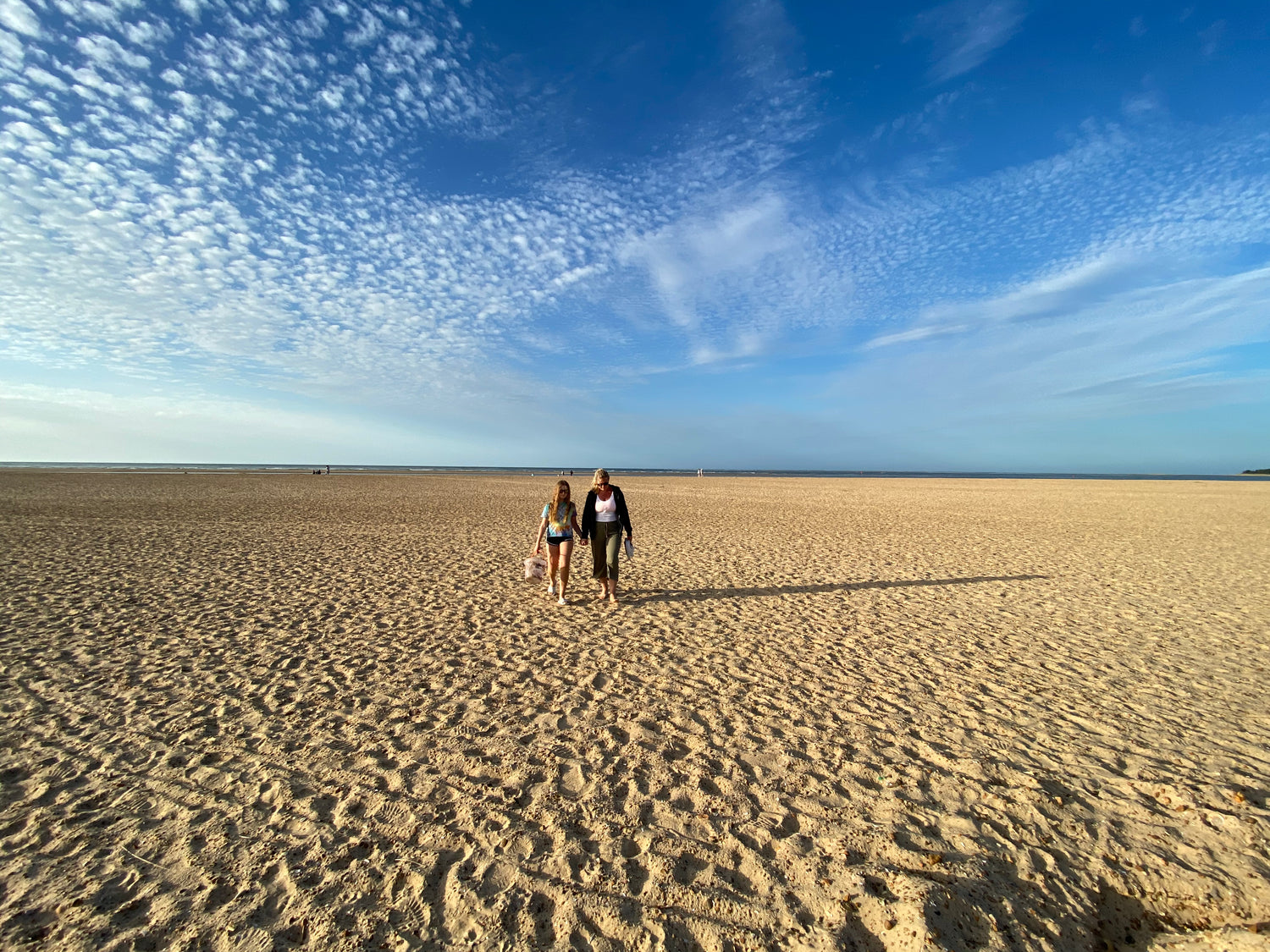 Endless blue sky at the sandy beach