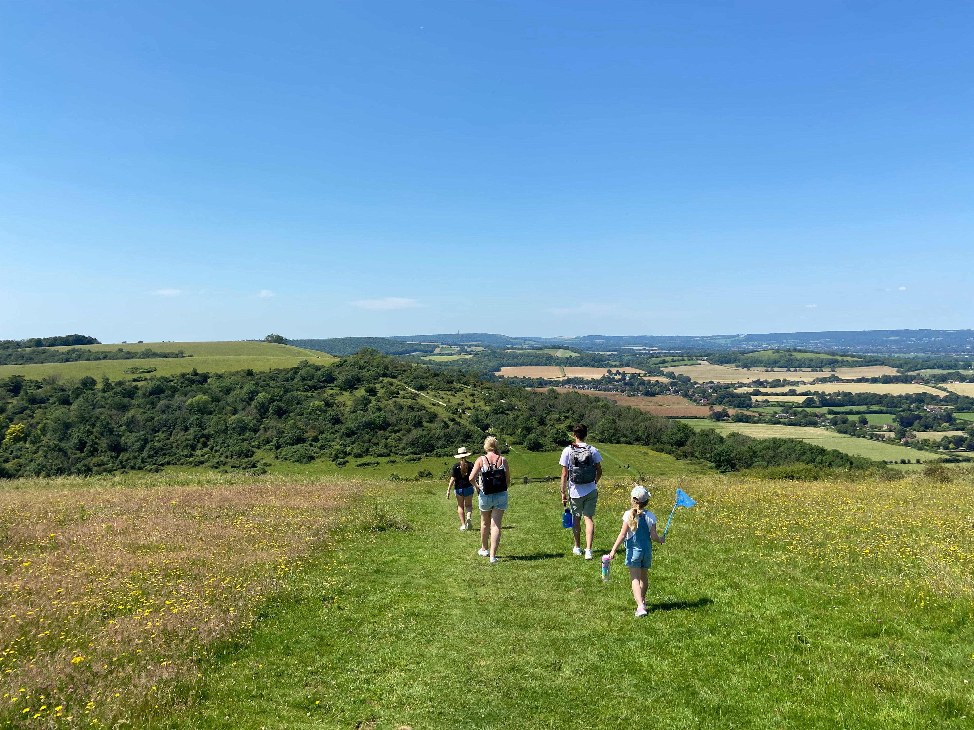 The Sundfoerr change robe family taking in the view in the South Downs